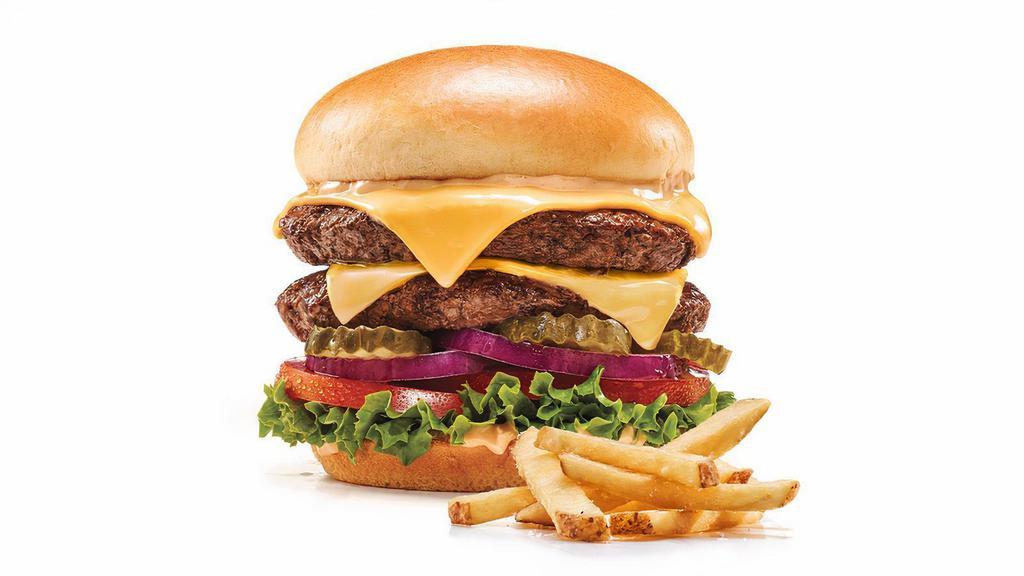 Mega Monster Cheeseburger · No need to fear this monster. Two all-natural black angus steakburger patties, American cheese, lettuce, tomato, red onion, pickles & IHOP® Sauce. Chicken options not available.