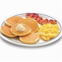 Silver 5 · Five silver dollar buttermilk pancakes, 1 scrambled egg, 1 custom-cured hickory-smoked bacon...