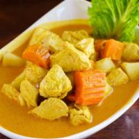 Yellow Curry Chicken · Chicken, potatoes, carrots, & onion in yellow coconut milk curry.