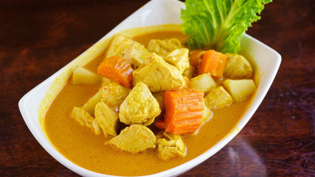 Yellow Curry Chicken · Chicken, potatoes, carrots, & onion in yellow coconut milk curry.