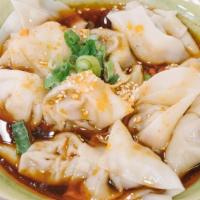 48. Red Chili Oil Wonton · Pork wonton topped with red chili oil.