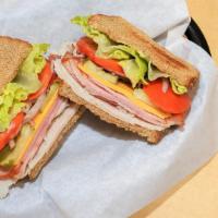 Deli Sandwich · Made with choice of wheat, white, rye or sourdough bread, mayonnaise, mustard, lettuce, toma...