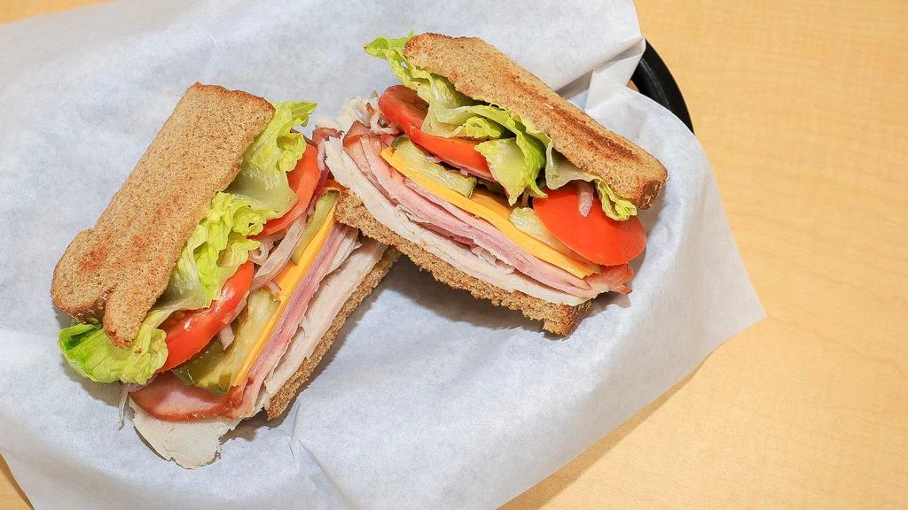 Deli Sandwich · Made with choice of wheat, white, rye or sourdough bread, mayonnaise, mustard, lettuce, tomato, onion, pickle, jalapeno.