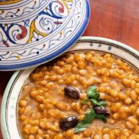 White Beans · Vegetarian. Moroccan Stewed White Beans with fresh tomatoes, spices, garlic and herbs.