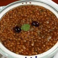Lentils · Vegetarian. Moroccan Stewed Lentils with fresh tomatoes, spices, garlic and herbs.