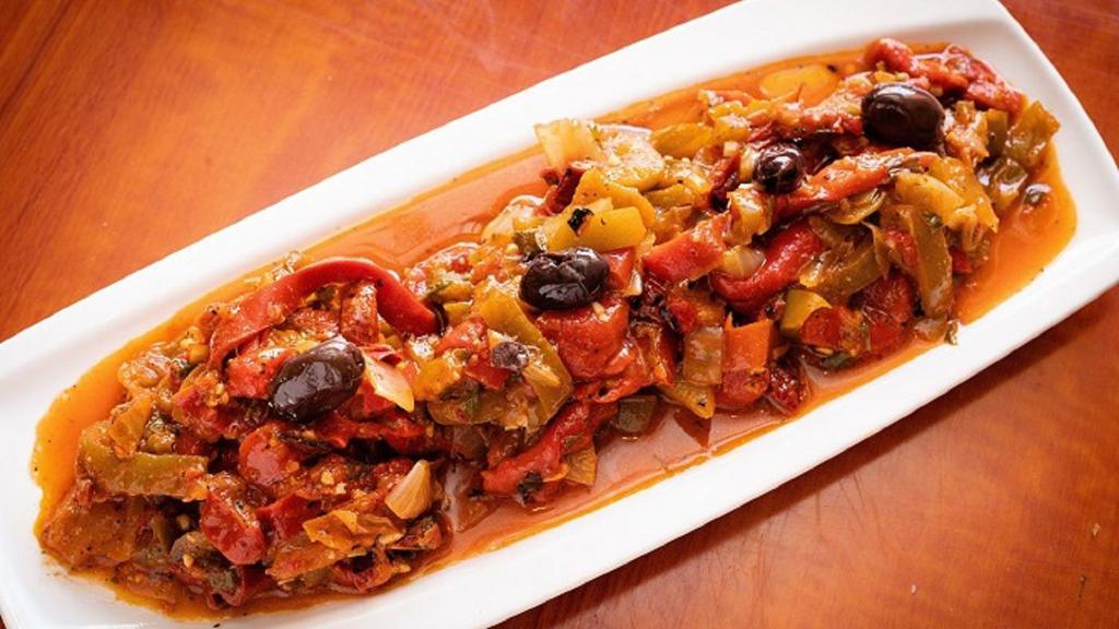 Taktouka · Vegetarian. Grilled bell peppers, tomatoes, garlic, olive oil.