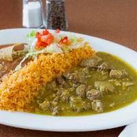 Chile Verde · Pork in green sauce, served with rice, refried beans, lettuce, cheese, pico de gallo and war...