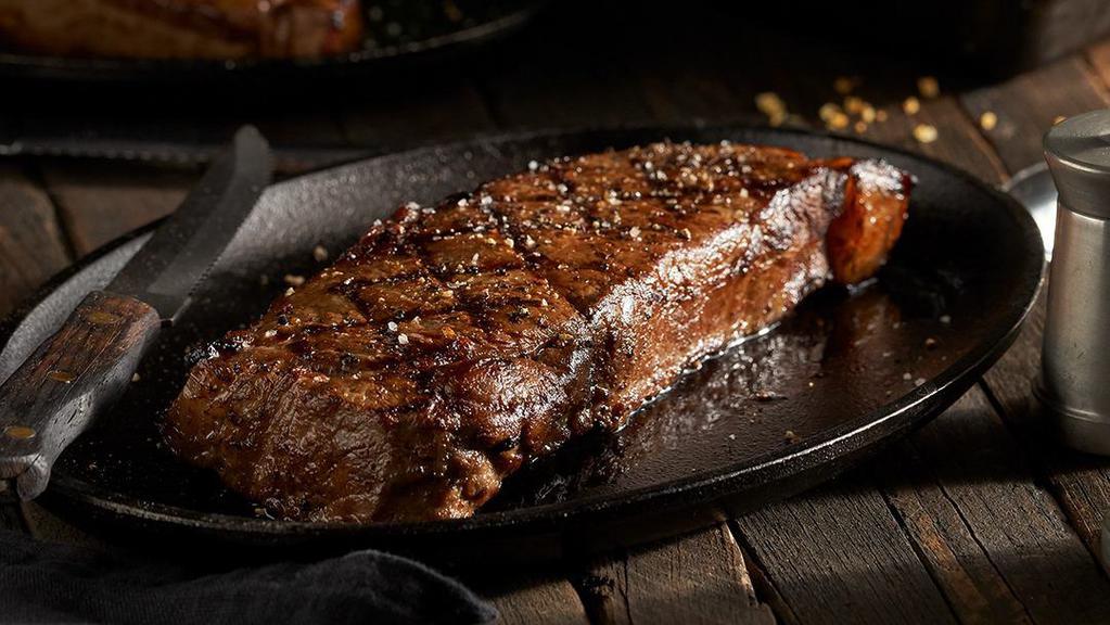 New York Strip Center-Cut · Hearty and robust, a perfect balance of flavor, texture, and tenderness.