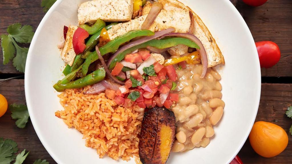 5. Fajitas Bowl · Served with Spanish rice, Peruvian beans , pico de gallo, and Maduro's Fritos (vegetarian). chips and salsas on the side.