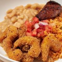 1. Quinoa Crusted Shrimp Bowl · Served with spanish  rice, Peruvian beans, pico de gallo, and Maduro's fritos. chips and sal...