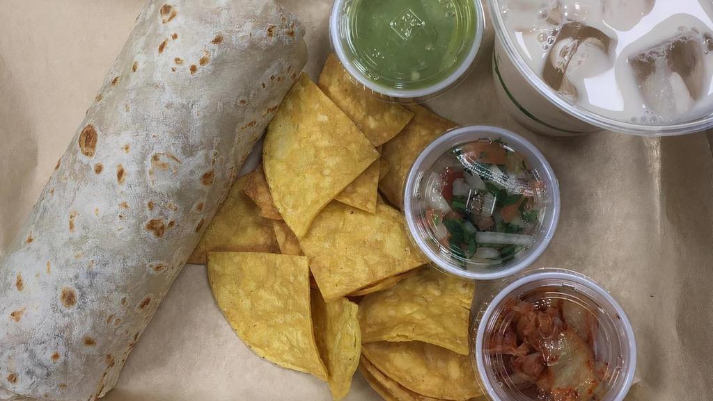 Steak Burrito, Chicken, Carnitas or Tofu Vegetarian Burritos  · With Spanish rice, beans, 4-cheese blend, and salsa fresca. Served with corn chips and trio salsas.