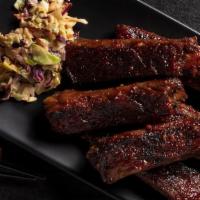 Bbq Pork Spare Ribs · Slow-braised pork ribs wok-seared with a tangy Asian barbecue sauce