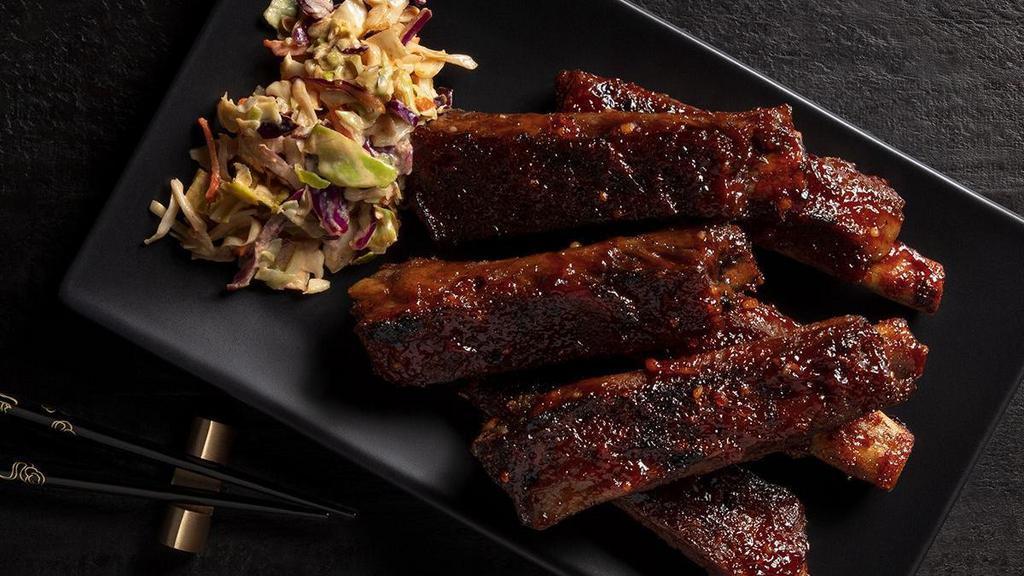 Bbq Spare Ribs · Slow-braised pork ribs wok-seared with a tangy Asian barbecue sauce.