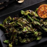 Shishito Peppers · Blistered Japanese peppers in a savory Mongolian sauce