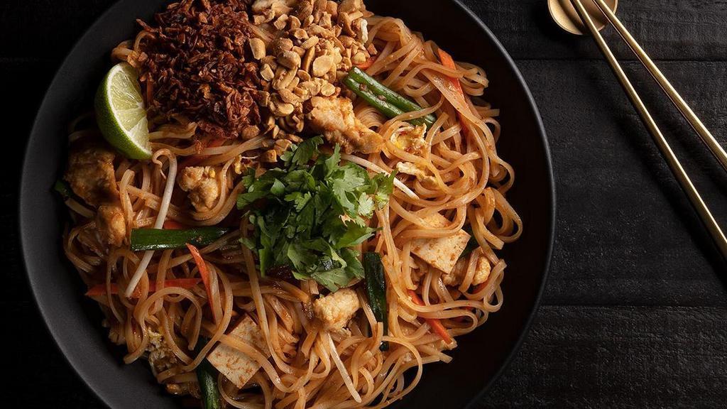 Pad Thai · Rice noodles, Thai spices, tofu, green onion, peanuts