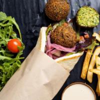 Falafel Wrap (3 pcs) · Falafel served in warm pita bread with homemade hummus, chopped salad, pickled onions and le...