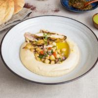Hummus with Grilled Marinated Chicken (gluten-free) · Served with 1 gluten-free pita and fresh jalapeno sauce.