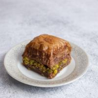 Chocolate Baklava (2 pcs) · Layers of filo dough and nuts with butter and cinnamon (2 pieces).