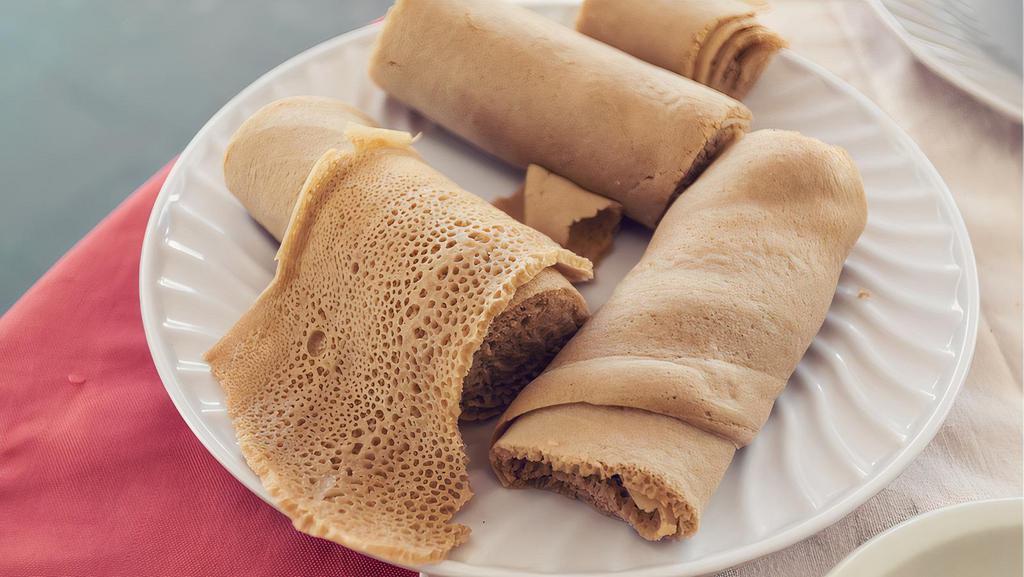 Injera (INJ) · Note: Injera is made with teff flour and barley which may have traces of gluten