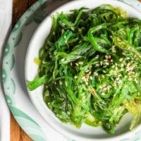 Seaweed Salad · Green seaweed salad.