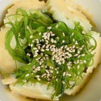Cucumber Salad · Cucumber, seaweed salad, sesame seed with dressing.