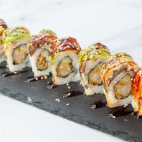 Dragon Roll ( 8 ) · Shrimp tempura, cucumber with eel and avocado on top, sesame seed, eel sauce.