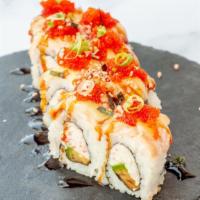 Lion King Roll ( 8 ) · Imitation crab meat, avocado with baked salmon, garlic cream sauce, eel sauce, tobiko, sesam...