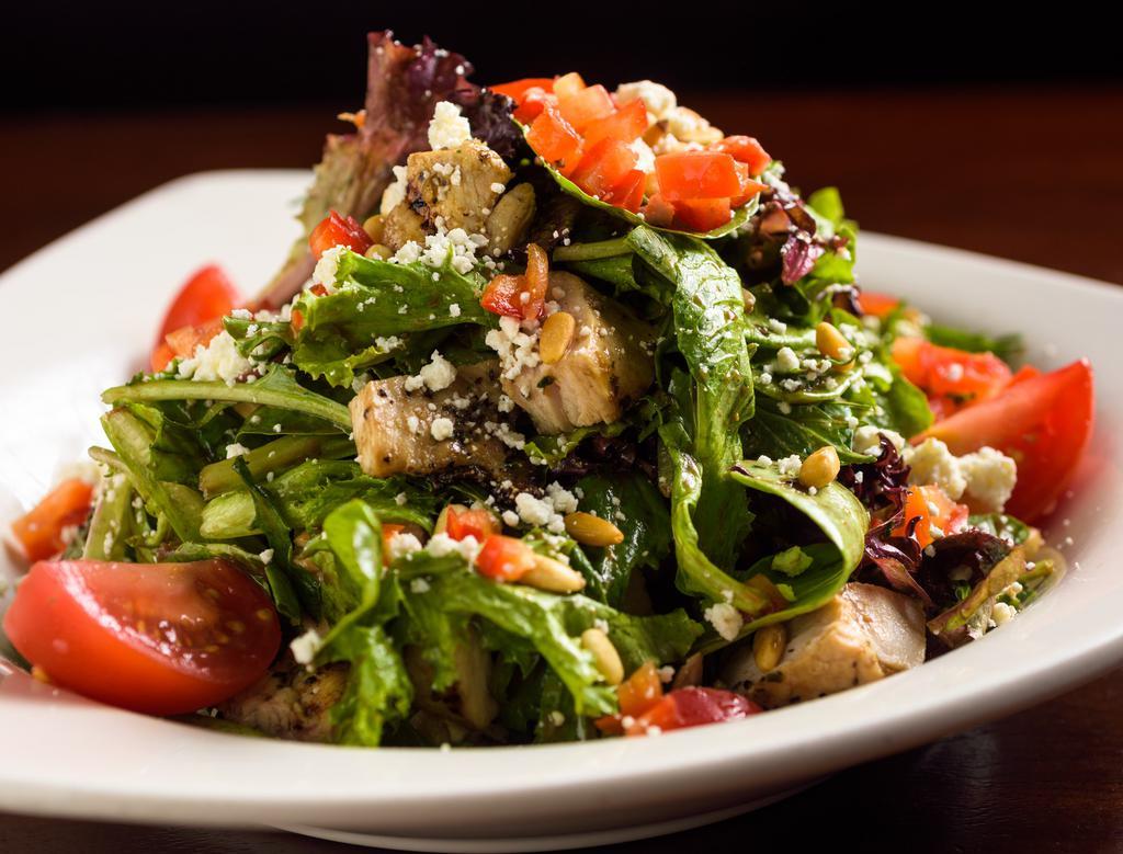 Monterey Chicken Salad · Micro organic greens, grilled marinated chicken breast, campari tomatoes, toasted pinenuts, diced red bell peppers, crumbled feta cheese & balsamic vinaigrette on the side.