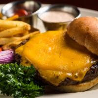 The Sundance Cheeseburger · Ground Certified Angus Beef flame grilled & topped with your choice of melted cheese on a to...