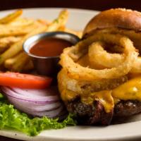 Hickory Burger · Ground Certified Angus Beef flame grilled & topped with melted Tillamook cheddar, applewood ...