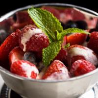 Wild Berries Grand Marnier · Organic strawberries, blueberries, and raspberries. Served with a grand marnier cream sauce ...