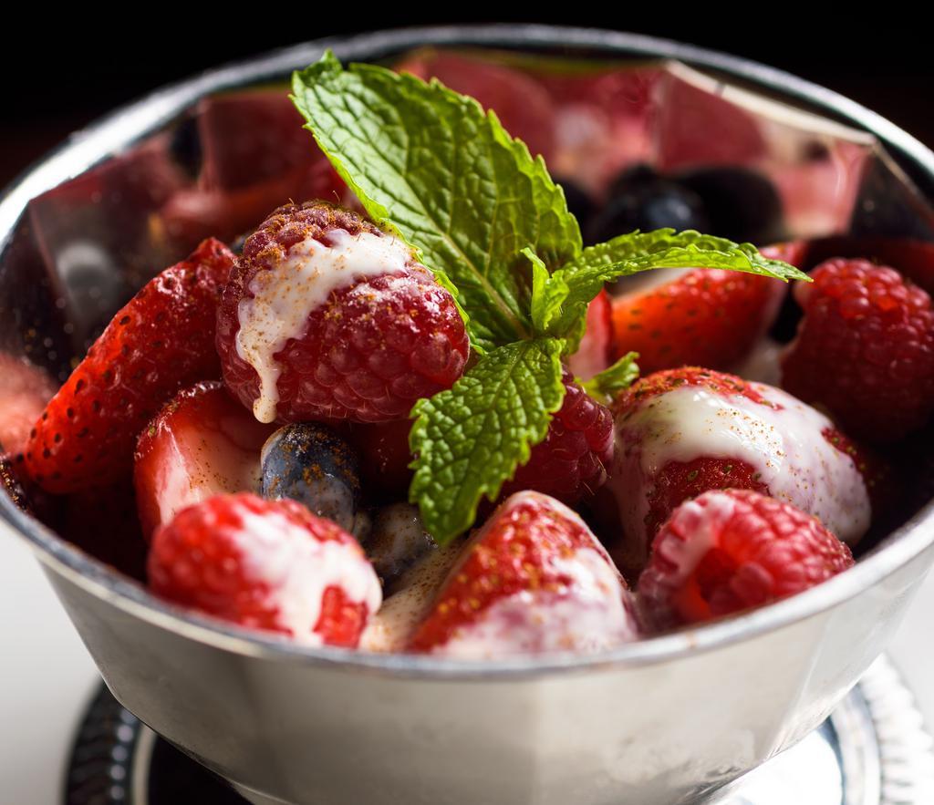 Wild Berries Grand Marnier · Organic strawberries, blueberries, and raspberries. Served with a grand marnier cream sauce on the side.