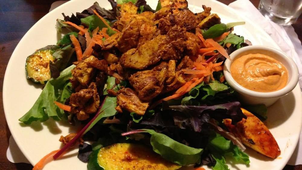 El Cerrito Salad · Baby green mix served with roasted marinated yellow squash, zucchini, diced grilled chicken breast and sun-dried tomato pesto vinaigrette.