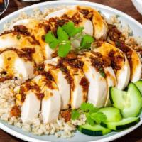 The Marina · Breast, Skinless, Organic Brown Rice, Garnished with Cucumber, Cilantro. KMG Sauce, Side of ...