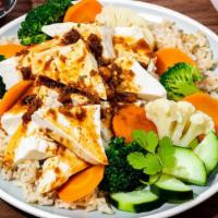 The Vegetarian · Organic Tofu, Brown Rice, Seasonal Veggies. KMG Sauce, Side of Vegetarian Broth