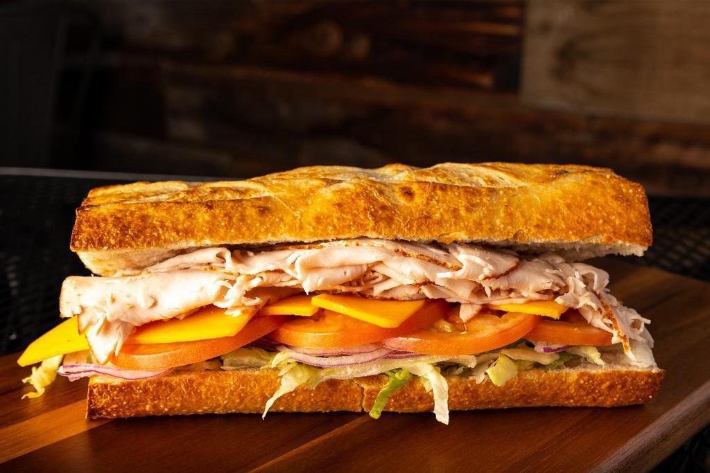 #1 Turkey · Please choose your toppings! Thinly sliced Turkey on our freshly baked Sourdough bread, built how you like it!