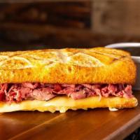 #2 French Dip · Thinly sliced Roast Beef with our House Sauce, Swiss Cheese, served on our freshly baked Sou...