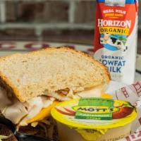 Kids W/Milk · A sliced Honey Wheat bread half sandwich, built to liking! Served with Applesauce & Milk