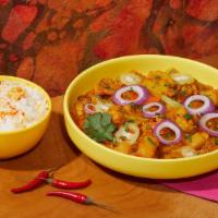 Vegetable Vindaloo · Vegetables in a spicy curry sauce. Includes side of Rice.