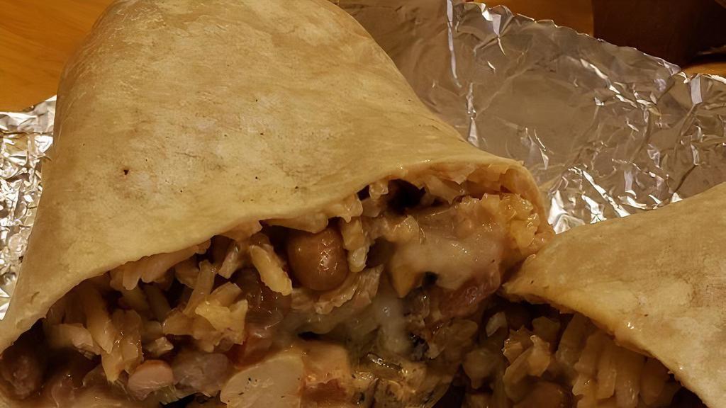 Burrito Wrap al Mojo de Ajo · Flour tortillas, Mexican rice, pinto beans, sauteed garlic shrimps, Monterey jack cheese & pico de gallo.