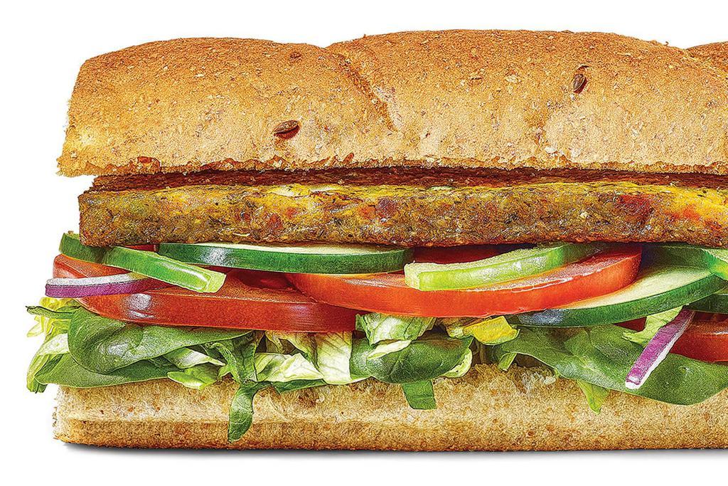 Veggie Patty · Delicious vegan patties with lettuce, tomatoes, cucumbers, green peppers and red onions, all served on our freshly baked Hearty Multigrain bread.