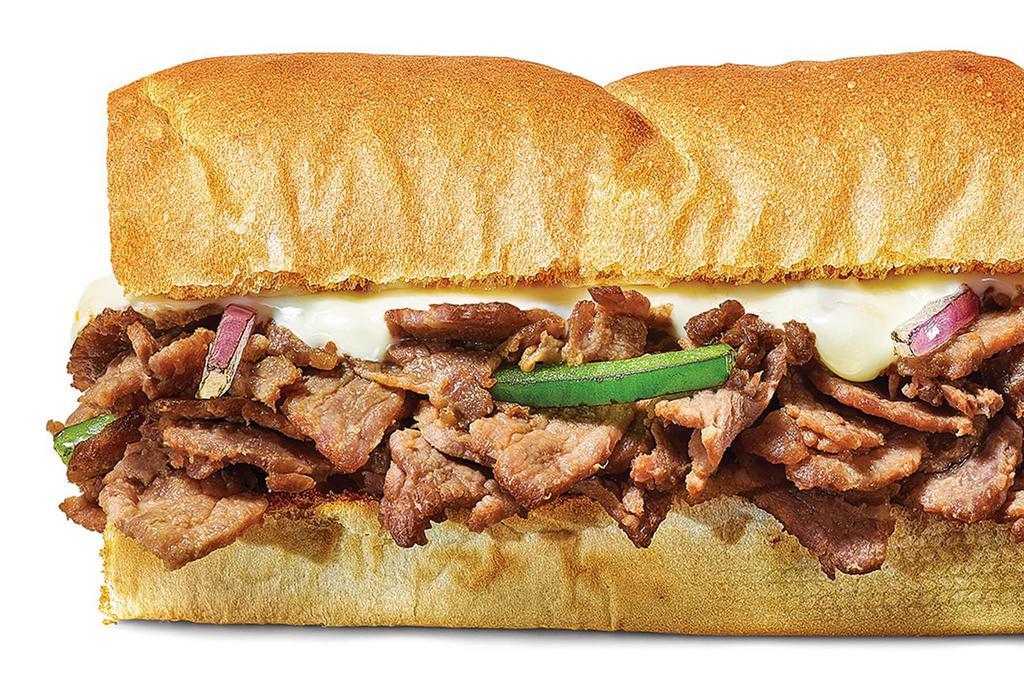 Steak & Cheese · Our Steak & Cheese sandwich is where warm, delicious steak gets topped with melty cheesiness. Get crazy with veggies and sauces to make it what you want.