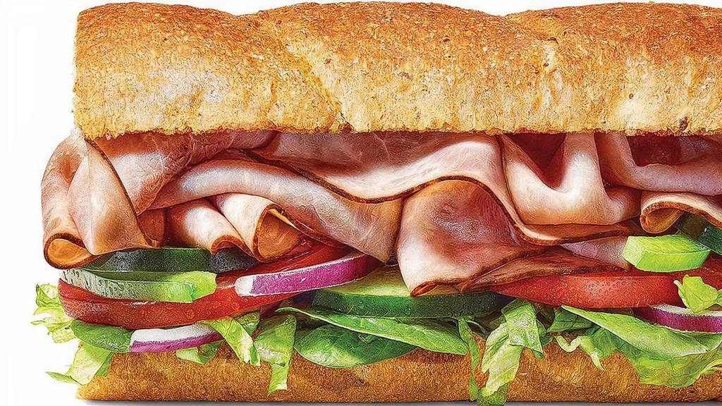 Black Forest Ham · Our Black Forest Ham sandwich is a true classic. We add lettuce, baby spinach, cucumbers, green peppers and red onions to our delicious, thin-sliced ham and serve it on our Hearty Multigrain bread. Want cheese? Just ask.