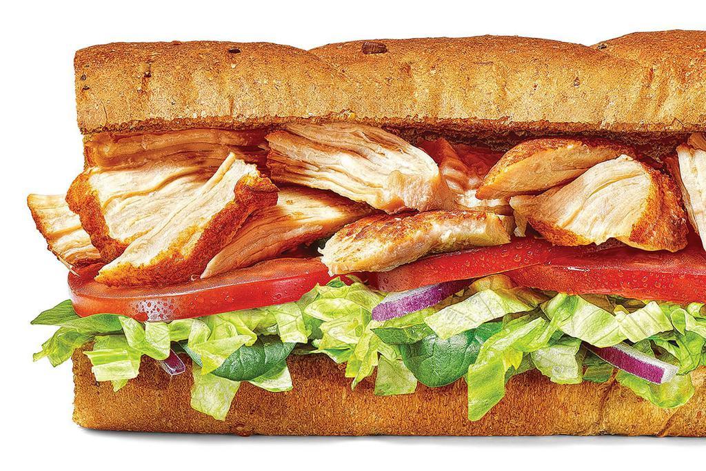Rotisserie-Style Chicken · Who doesn’t love tender, juicy rotisserie-style chicken? Especially when it’s served on our Hearty Multigrain bread with your choice of veggies. We like lettuce, tomatoes, red onions, and peppers, but hey, it’s your sandwich, do what you like.