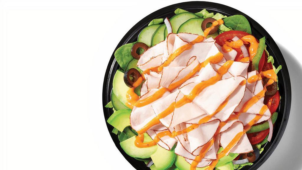 Baja Turkey With Sliced Avocado (380 Cals) · Give your lunch a boost with a double portion of Oven-Roasted Turkey, along with Sliced Avocado and Baja Chipotle sauce on a bowl of greens and veggies.