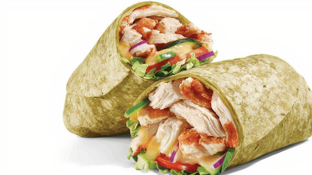  Honey Mustard Rotisserie-Style Chicken (520 Cals) · Something tasty is unfolding! Rotisserie-Style Chicken, crisp veggies, and Honey Mustard are served in a hearty spinach wrap.