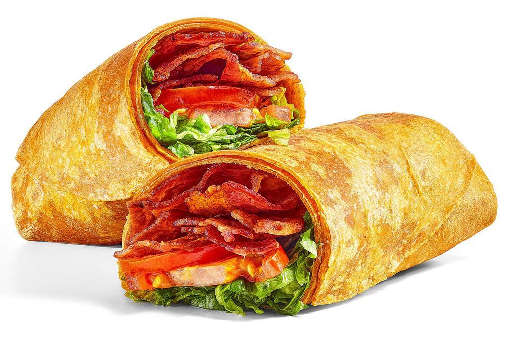 L.T. (620 Cals) · Simply delicious! This classic on a Tomato Basil wrap, is filled with a double portion of our crispy hickory smoked bacon and finished off with lettuce, juicy tomatoes, and mayo.