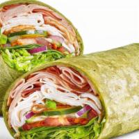 Oven Roasted Turkey & Ham (430 Cals) · Take a bite of this Spinach wrap filled with a footlong portion of our tender, thin-sliced o...
