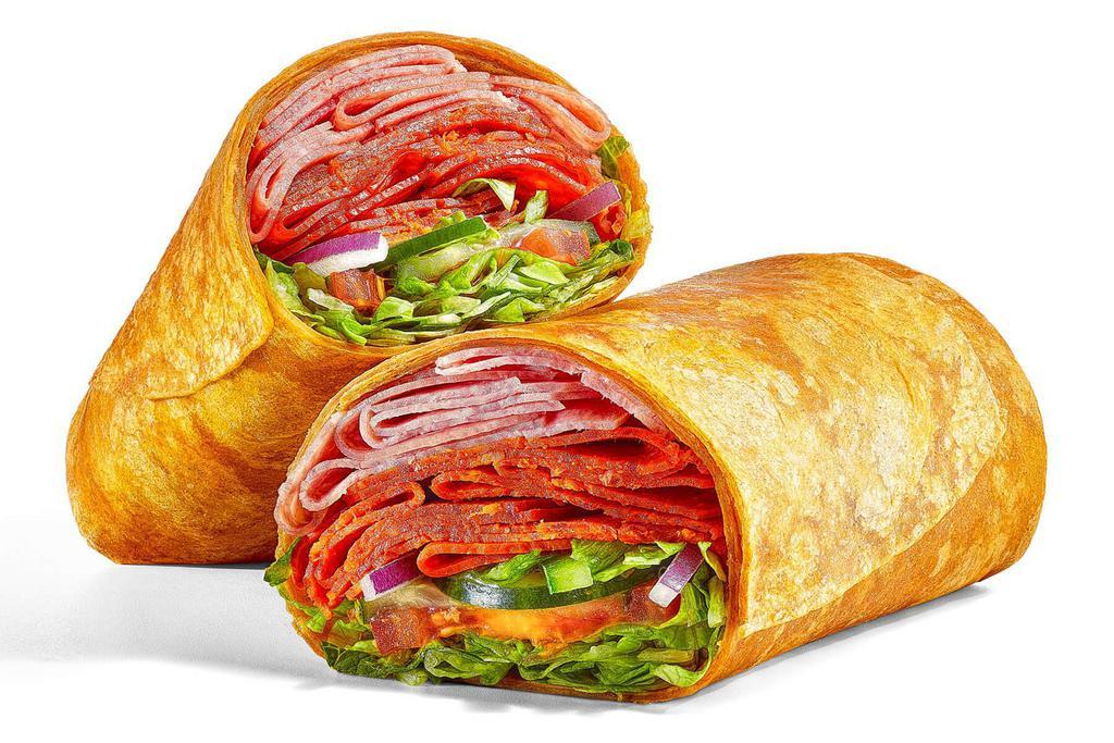 Spicy Italian (810 Cals) · Feeling spicy? Grab a Spicy Italian wrap. It's a double portion of spicy pepperoni and Genoa salami on a tomato basil wrap. Topped with lettuce, tomatoes, cucumbers, green peppers and red onions…it's a pretty delicious meal.