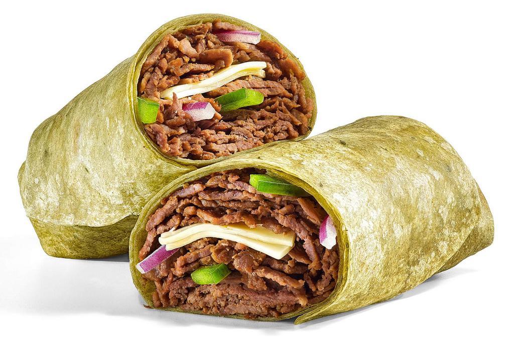 Steak & Cheese (570 Cals) · Our Steak & Cheese wrap is a double portion of shaved steak, wrapped up with melty American cheese in a spinach wrap. Get crazy with veggies and sauces to make it what you want.